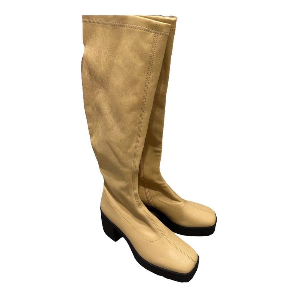 Akaada Izumi Pastel Yellow Stretch Leather Chunky Boots
Never Worn
EU 40 
US W 9